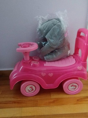 Children's ride-on car used with new elephant toy with sound and moving ears