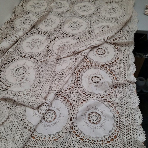 Embroidered tablecloth with lace and handmade crochet