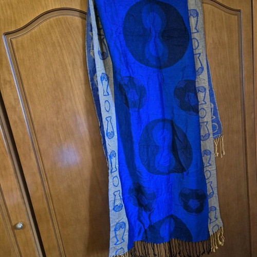 Women's scarf like new in vibrant blue with artistic pattern