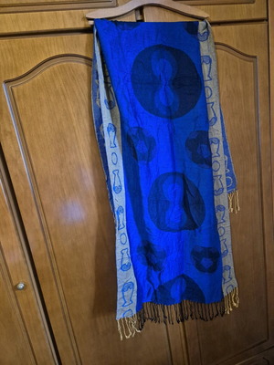 Women's scarf like new in vibrant blue with artistic pattern