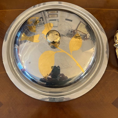 Serving dish made of steel with gold details like new