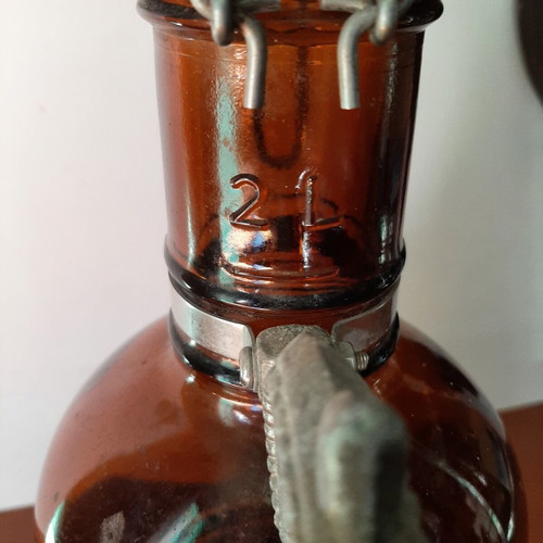 German vintage beer bottle growler with metal handle