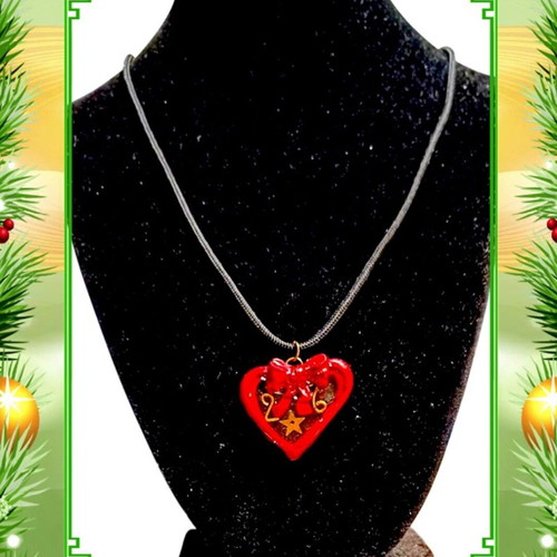 Handmade 2026 lucky charm necklace with heart of polymer clay and resin on black cord