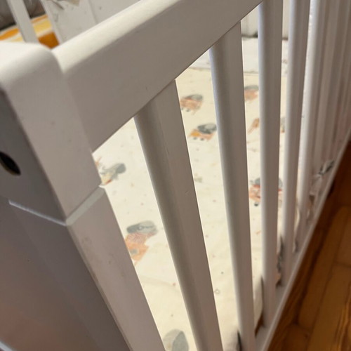 Baby cot like new with unused bedding set and cot bumper