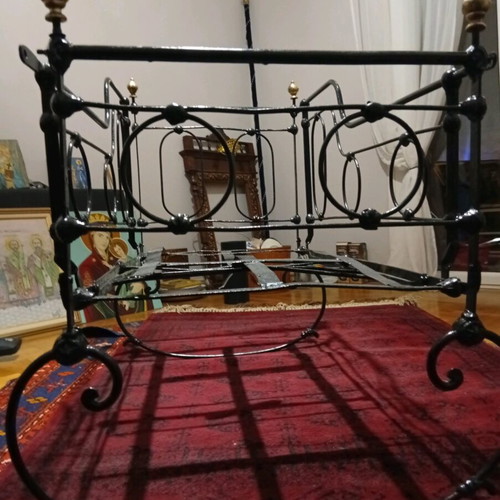 Baby cradle old handmade iron with bronze details refurbished