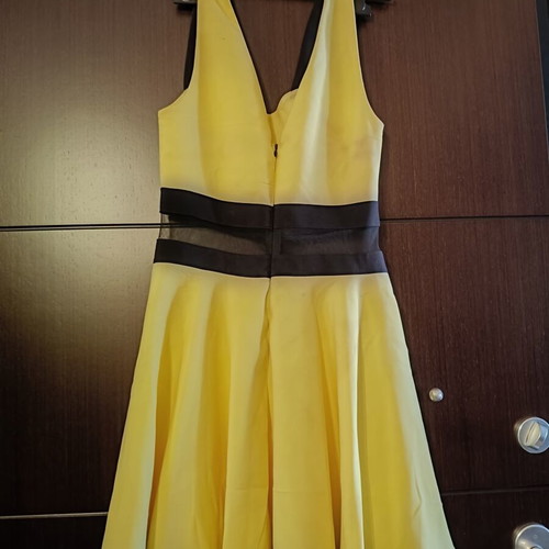 Cocktail dress with transparency at the waist like new, size M