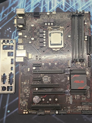 Asus Prime 250 Plus motherboard set with Intel i5 7500, backplate, heatsink