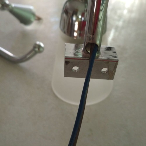 Bathroom accessory set like new with light, paper holder, and double hooks