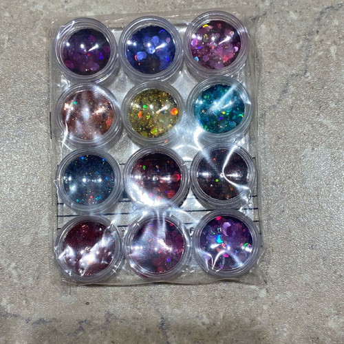 Glitter set of 12 pieces new, sealed