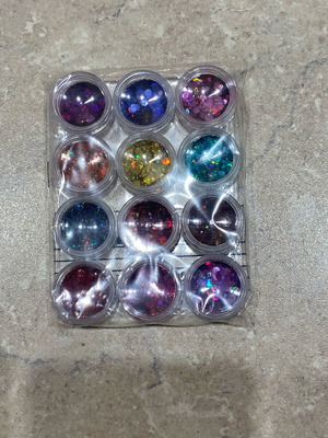 Glitter set of 12 pieces new, sealed