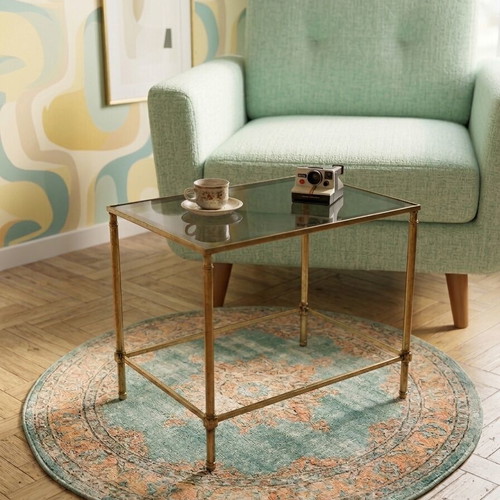 Midcentury metal coffee table with glass base used