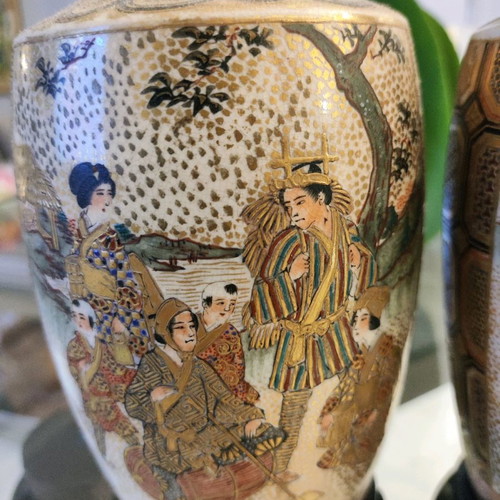 Satsuma vases used on wooden base
