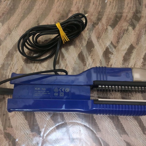 KLM VapoStir Steam Straightener used with steam function