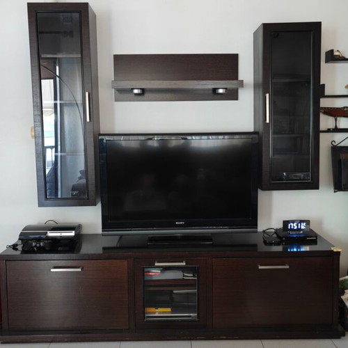 Living room unit used with lower cabinet, wall columns, and shelves