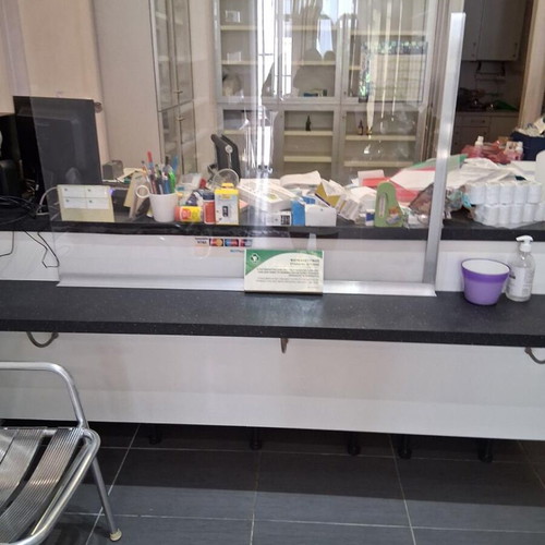 Reception desk used with storage and Plexiglass protection