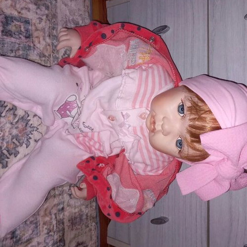 Porcelain doll like new in very good condition