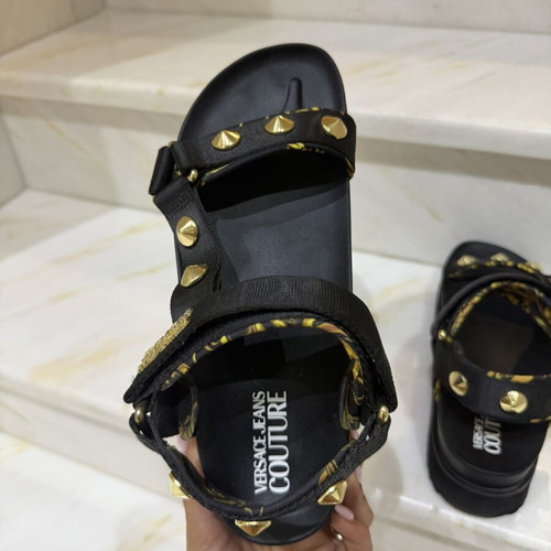 Versace sandals used, black and gold, size 40