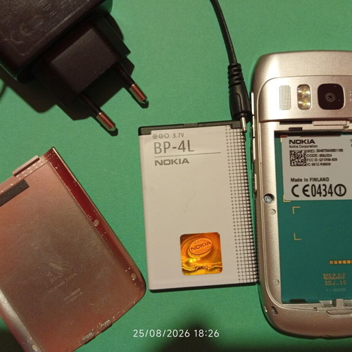 Nokia E6-00 mobile phone, silver, 8 MP camera, Symbian Anna