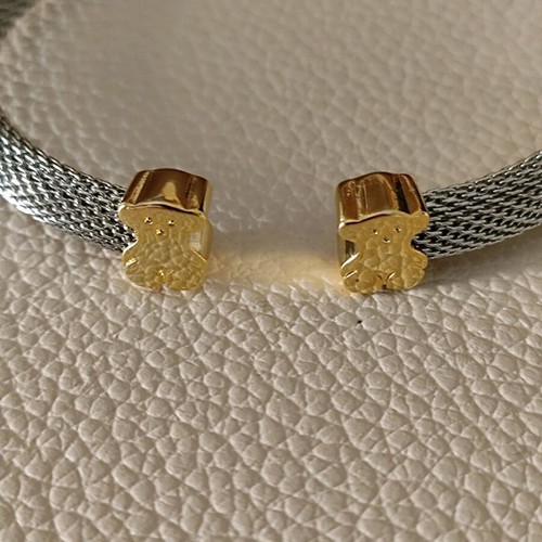 Tous bracelet with gold 750 and stainless steel in new condition