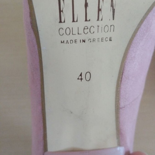 Ellen pink pumps used with some defects, size 40
