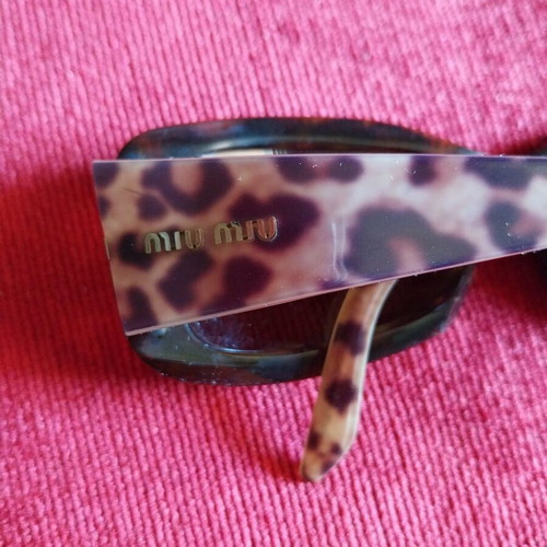 Miu Miu women's tortoise shell eyeglass frames used