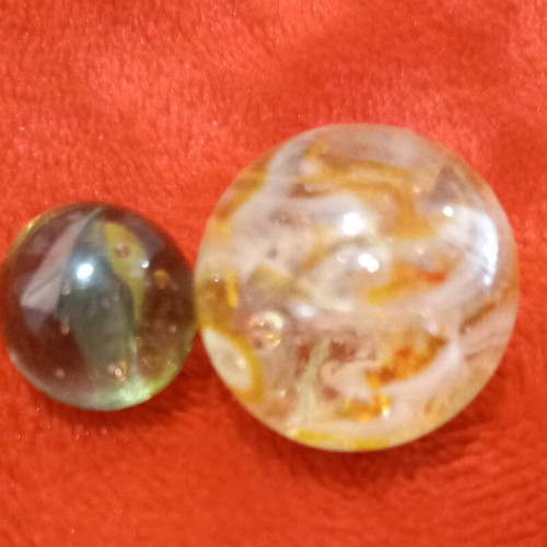 Vintage glass marbles used, set of 2, large one chipped