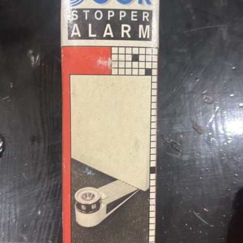 Door wedge with built-in alarm used