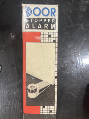 Door wedge with built-in alarm used
