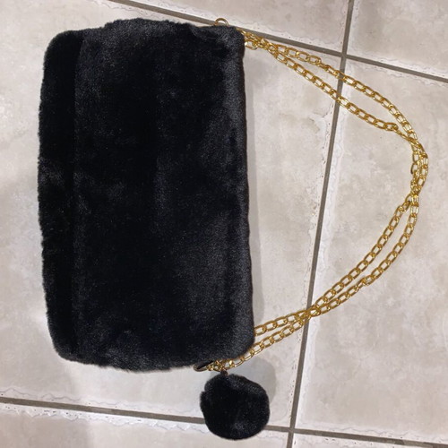 Evening shoulder bag like new, black with gold details