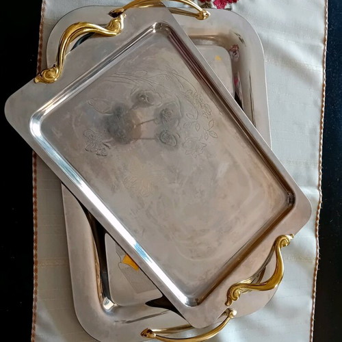 Set of three used serving trays, stainless steel inox 18/10 with gold details
