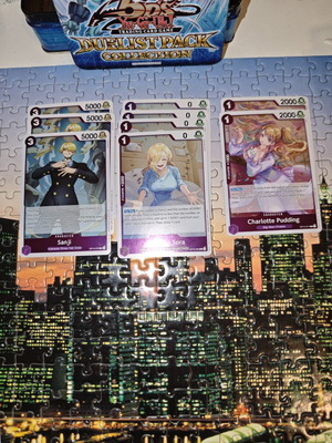 One Piece purple card pack with Sanji, Vinsmoke Sora, Charlotte Pudding