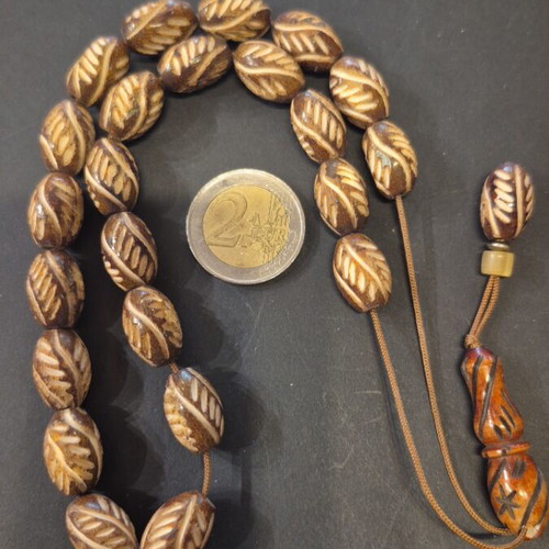 Komboloi carved bone, new, 23 beads 11×16mm