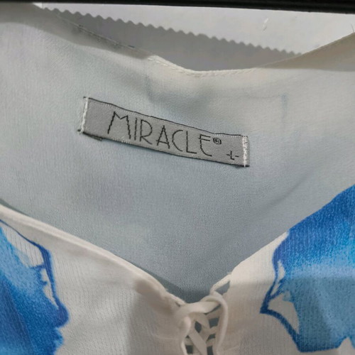 Miracle women's blouse like new, white with blue flowers, size Large