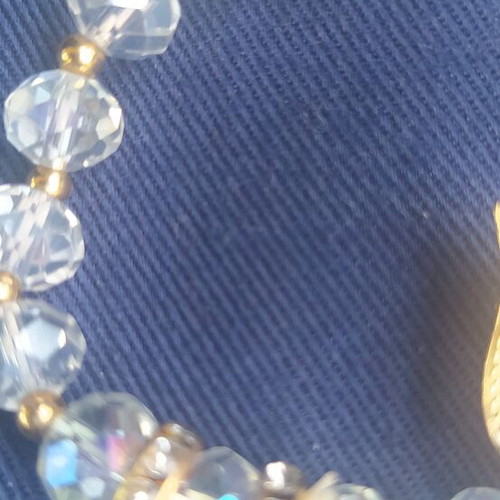 Steel bracelet with crystals new, white and gold details