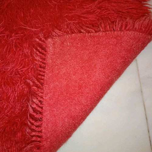 Traditional flokati runner used, red wool