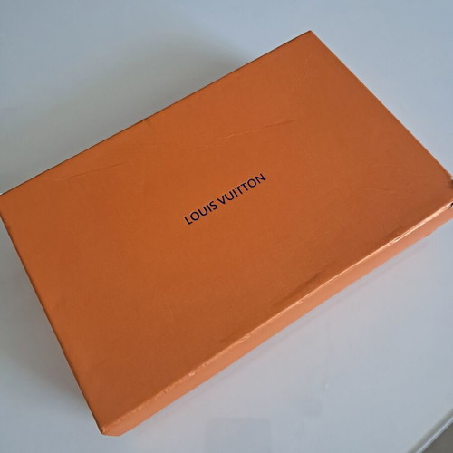 Louis Vuitton leather belt with interchangeable buckles