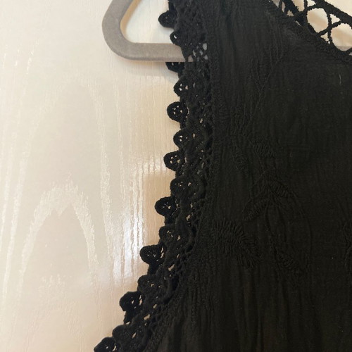 Black sleeveless top size M with beautiful reversible details