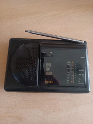 Vintage Silver AM FM portable radio used
