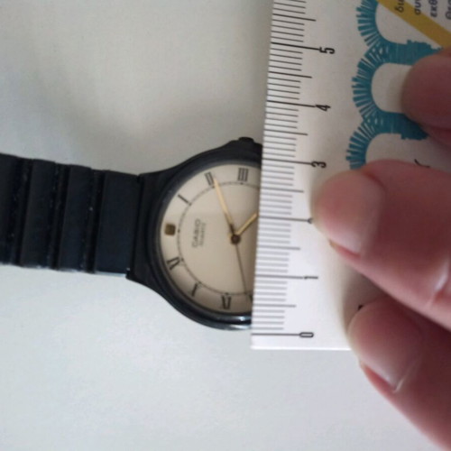 Orient quartz used, black, functional with light scratches