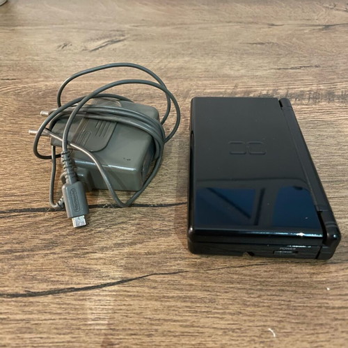 Nintendo DS Lite used, black with cartridge and original charger