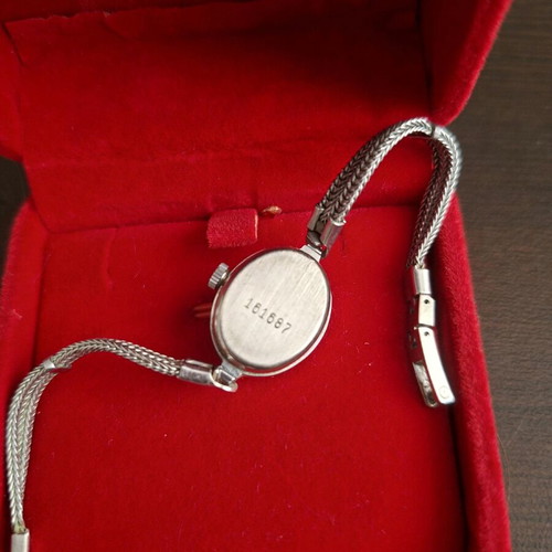 Chaika mechanical women's watch used, silver-tone