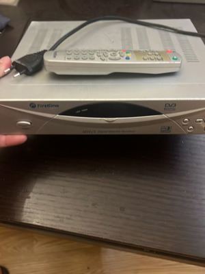 Firstline 2018 CI digital satellite receiver used with remote control