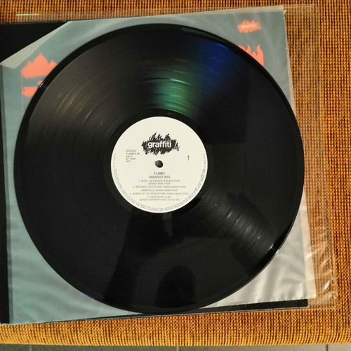 Flames Made in Hell and Greatest Hits vinyls used, metal