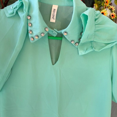 Women’s blouse small pistachio green like new with rhinestones