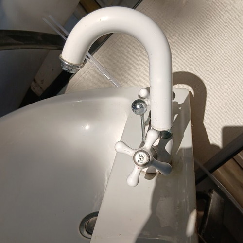 Gravena bathroom sink with built-in faucet like new