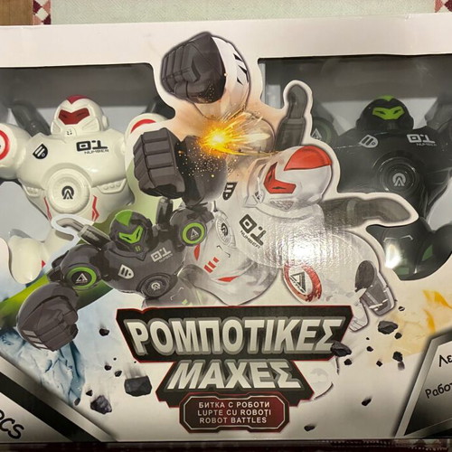 Robot robotic battles 2 robots like new with remote controls, light and sounds