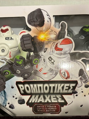 Robot robotic battles 2 robots like new with remote controls, light and sounds