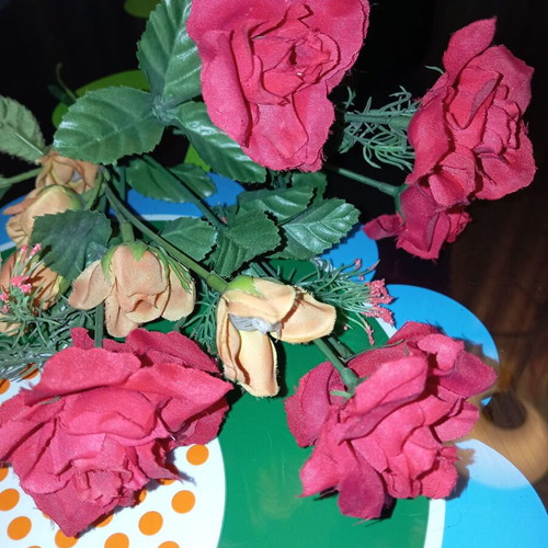 Bouquet of red artificial roses like new for decoration