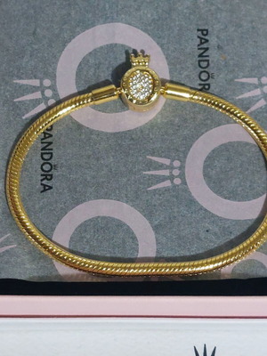 Pandora bracelet size 20 cm, gold plated with crown clasp
