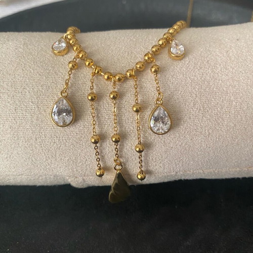 Steel necklace with rhinestones gold color new